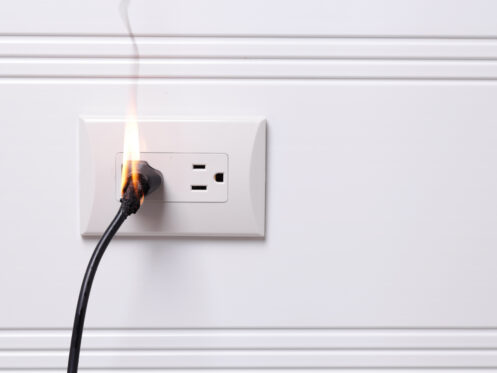 Electric plug on fire