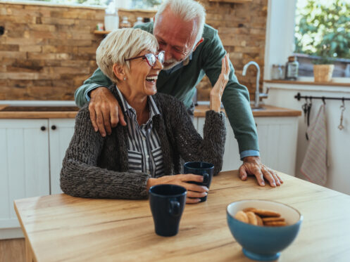 Couple enjoying a morning in their kitchen